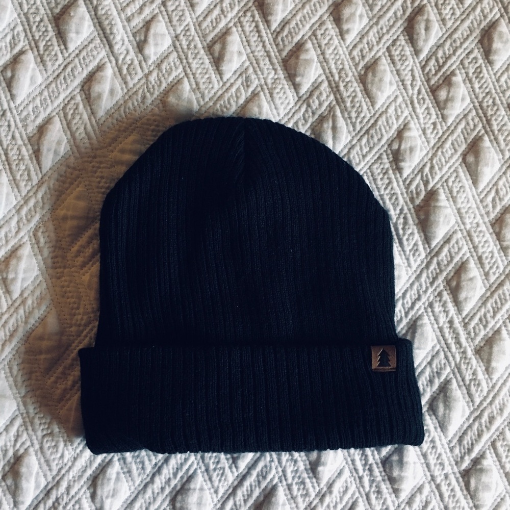 Black Beanie with tree tag.